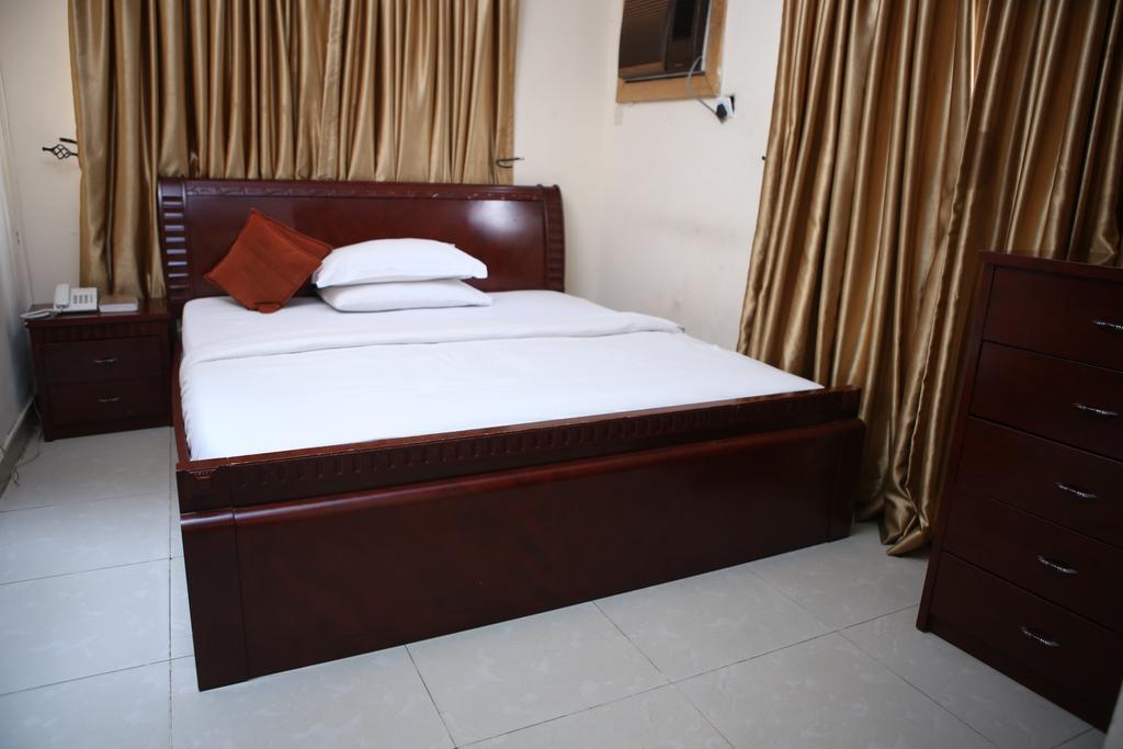 לגוס The Habitat Suites International חדר תמונה