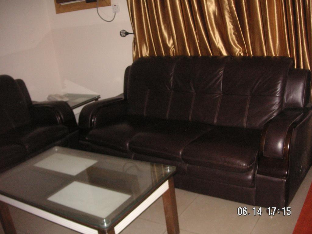 לגוס The Habitat Suites International חדר תמונה
